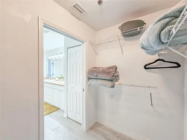 a view of a closet and storage