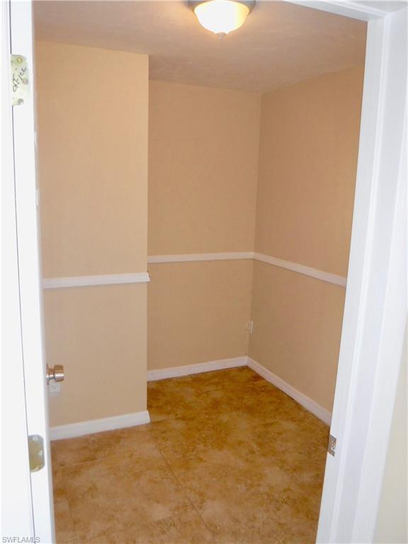 106 Oleander Road Lehigh Acres, FL 33936 - Photo 15 of 17 a view of an empty room