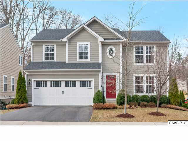 602 Rainier Road Charlottesville, VA 22903 - Photo 1 of 18 a front view of a house with a yard and a garage