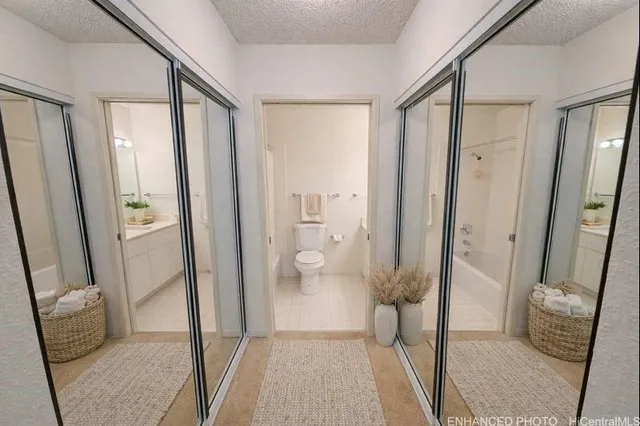 a bathroom with a shower and a sink