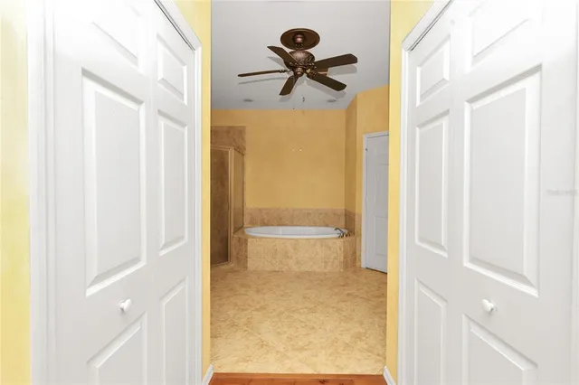 a bathroom with a shower and a sink