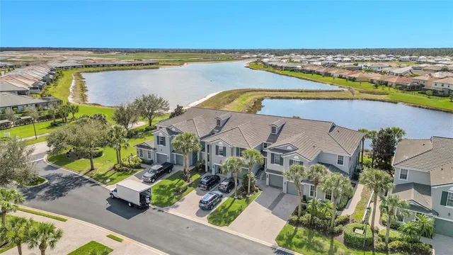 an aerial view of a house with a swimming pool