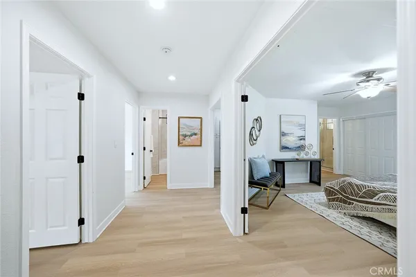 a view of a room with gym equipment and a window