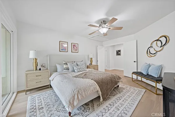 a bed room with a bed and a window