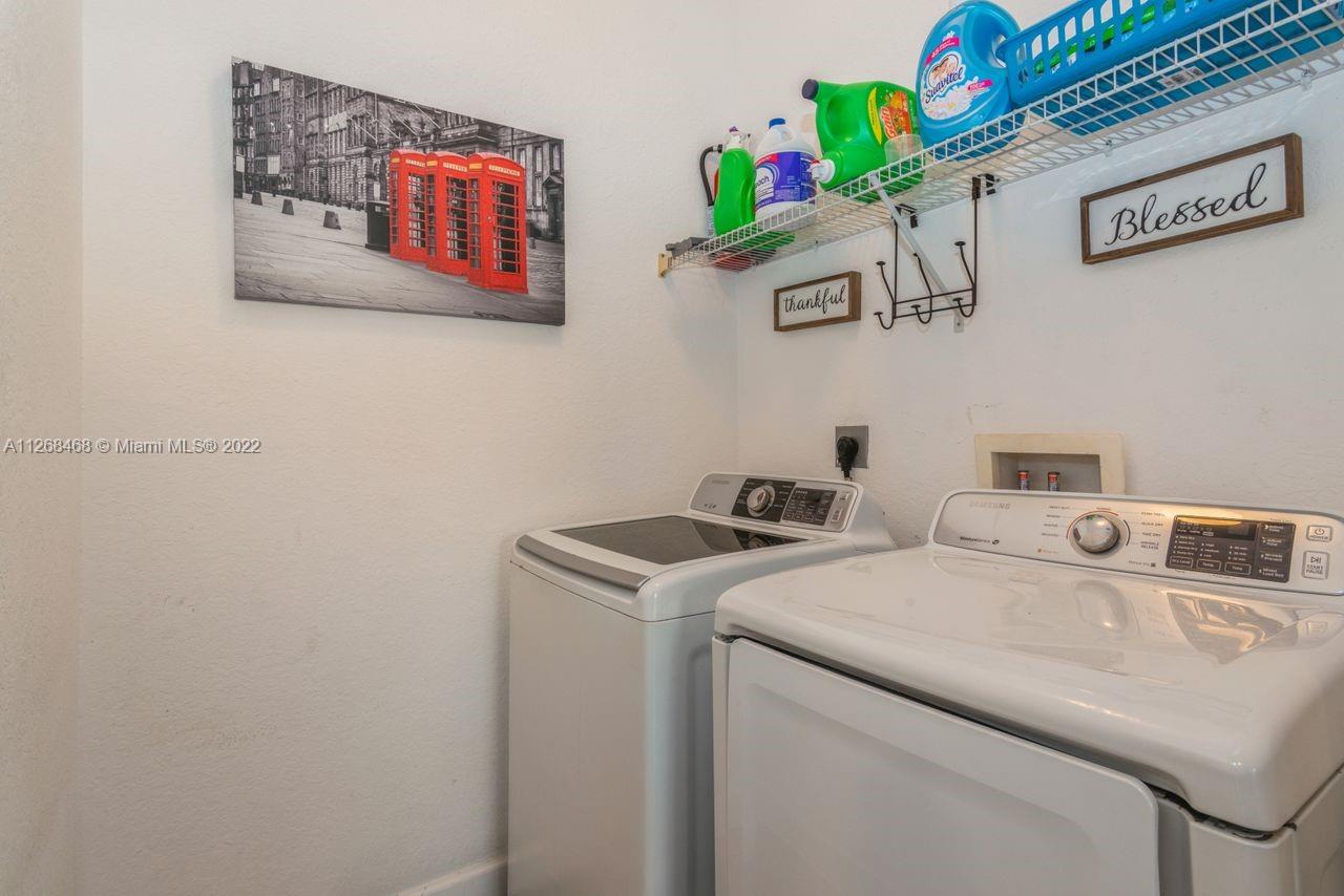 2240 Northeast 37th Terrace Homestead, FL 33033 - Photo 14 of 18 a utility room with dryer and washer