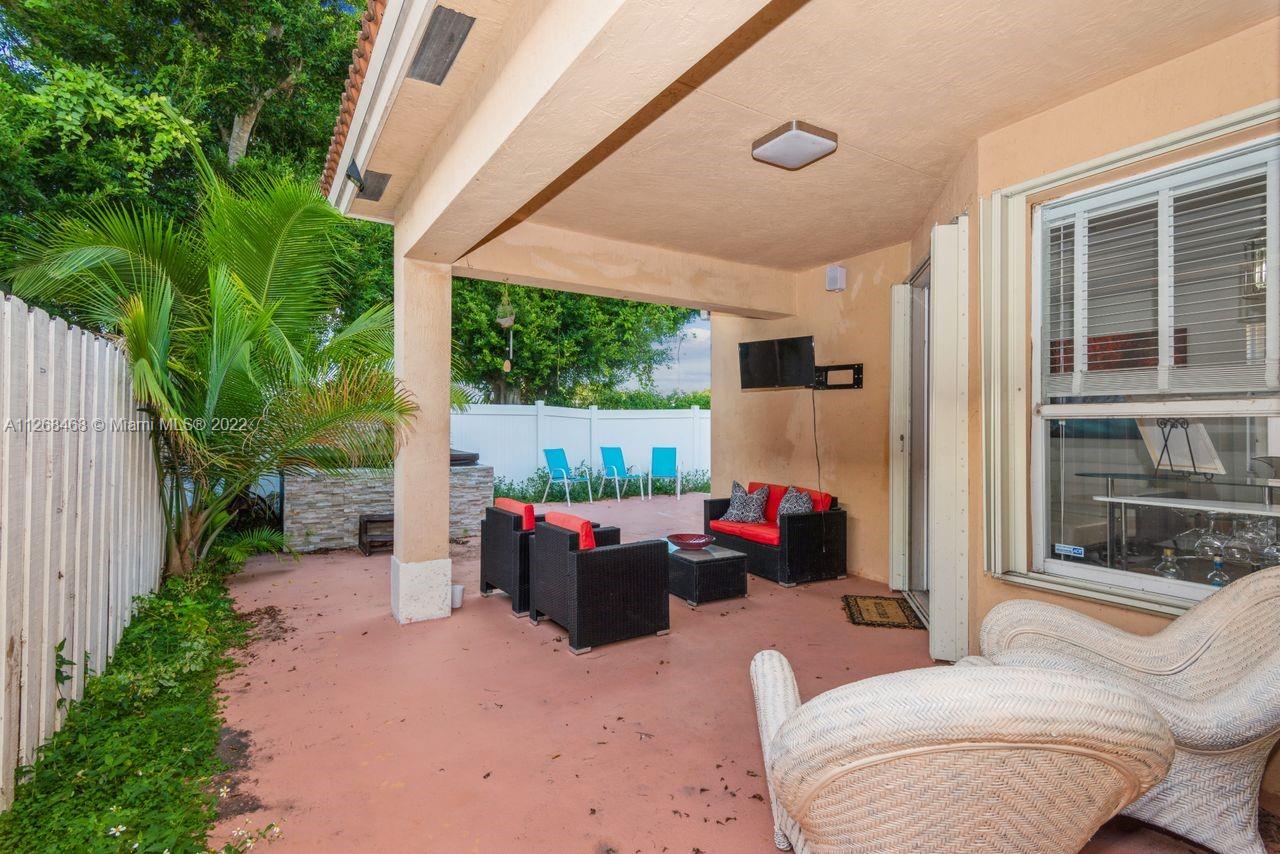 2240 Northeast 37th Terrace Homestead, FL 33033 - Photo 17 of 18 a building outdoor space with patio furniture