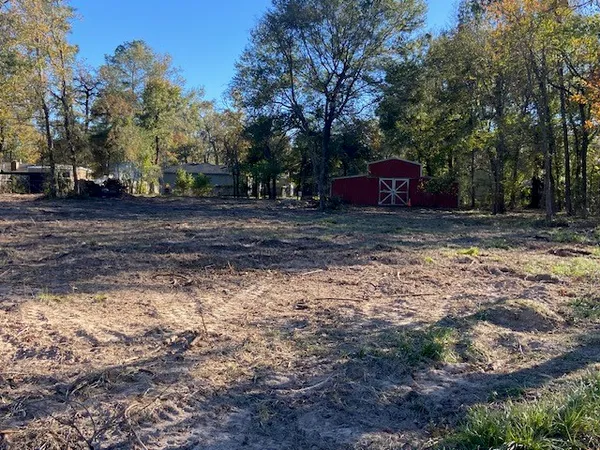 a fire hydrant in the middle of a field