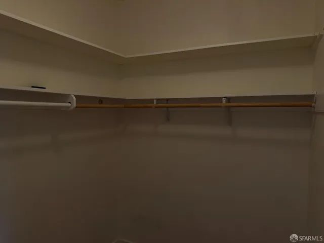 a view of a room with racks on the wall