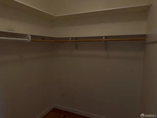 a view of a room with racks on the wall