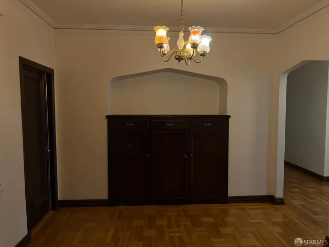 a kitchen with a sink and a refrigerator
