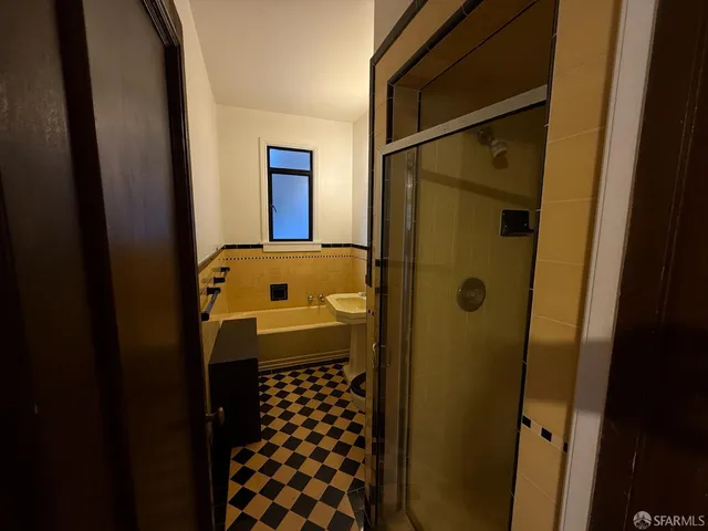 a view of a car parked in front of building