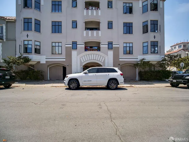 a view of a street with cars