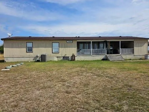 a house view with a garden space