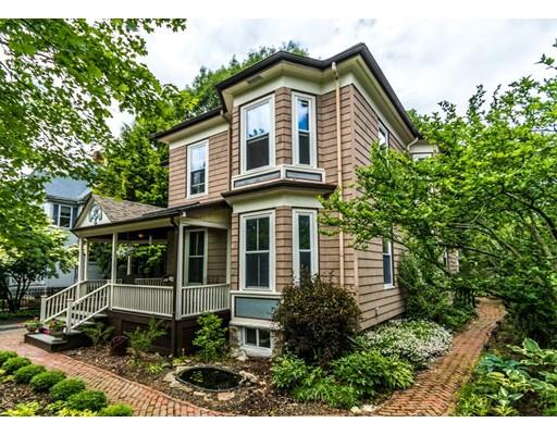 19 Forest Street Newton, MA 02461 - Photo 2 of 33 a front view of a house with a garden