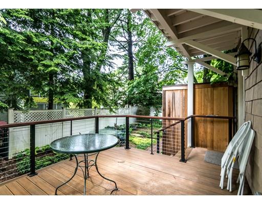 19 Forest Street Newton, MA 02461 - Photo 28 of 33 a balcony with wooden floor and outdoor seating
