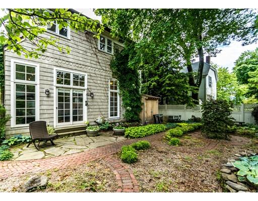 19 Forest Street Newton, MA 02461 - Photo 31 of 33 a front view of a house with a yard and potted plants