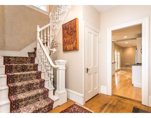 19 Forest Street Newton, MA 02461 - Photo 5 of 33 a view of entryway and hall with wooden floor