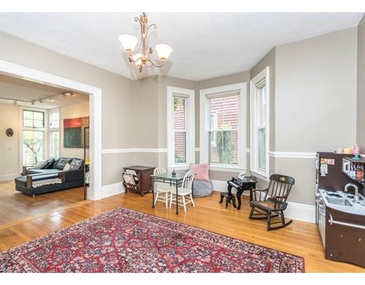 19 Forest Street Newton, MA 02461 - Photo 9 of 33 a living room filled with furniture potted plant and a table