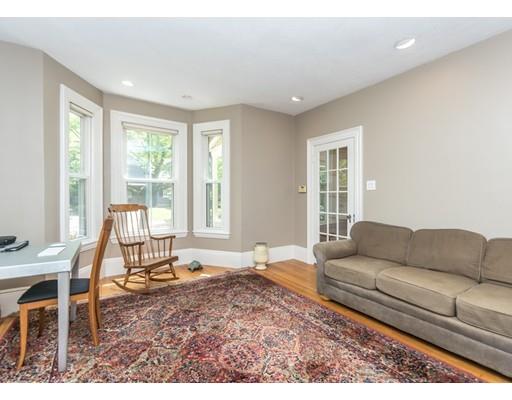19 Forest Street Newton, MA 02461 - Photo 10 of 33 a living room with furniture and a large window
