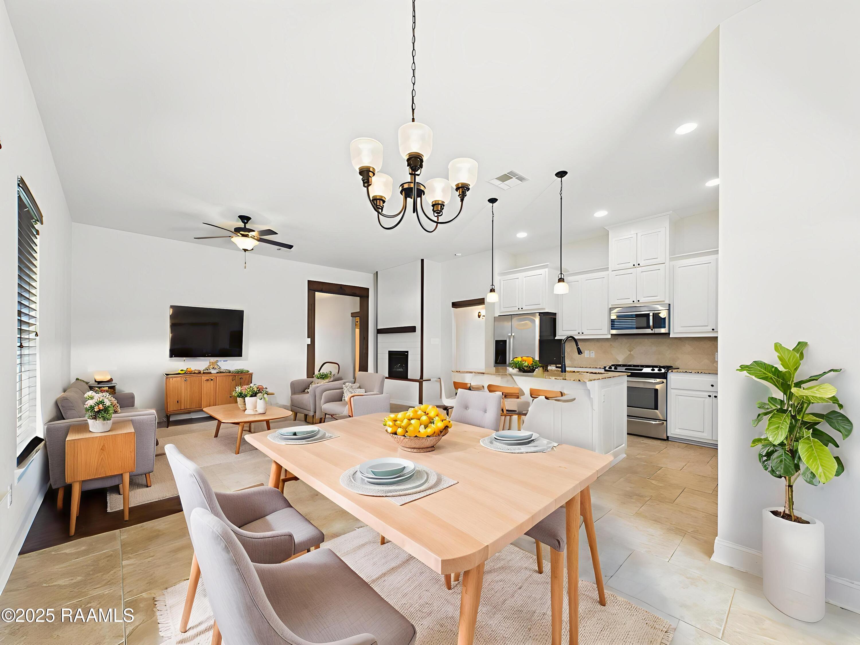 204 Whispering Meadows Road Broussard, LA 70518 - Photo 8 of 24 Living + Dining + Kitchen