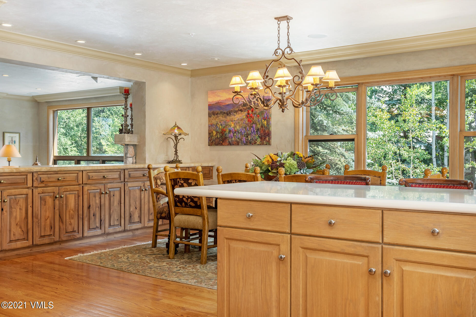 40 Elk Track Road, Unit 1 Beaver Creek, CO 81620 - Photo 11 of 31 a kitchen with sink cabinets and chandelier