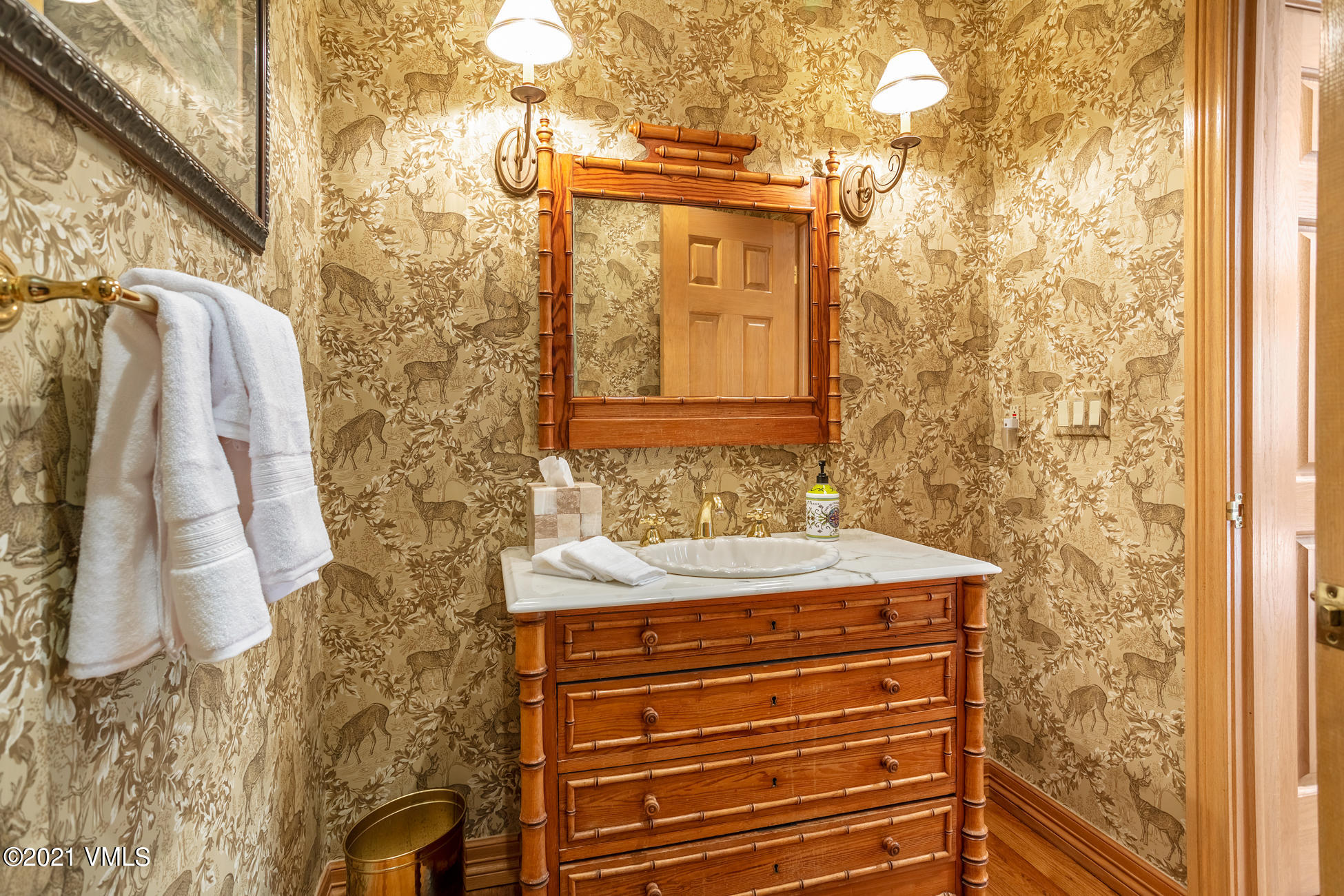 40 Elk Track Road, Unit 1 Beaver Creek, CO 81620 - Photo 13 of 31 a bathroom with a sink and a mirror