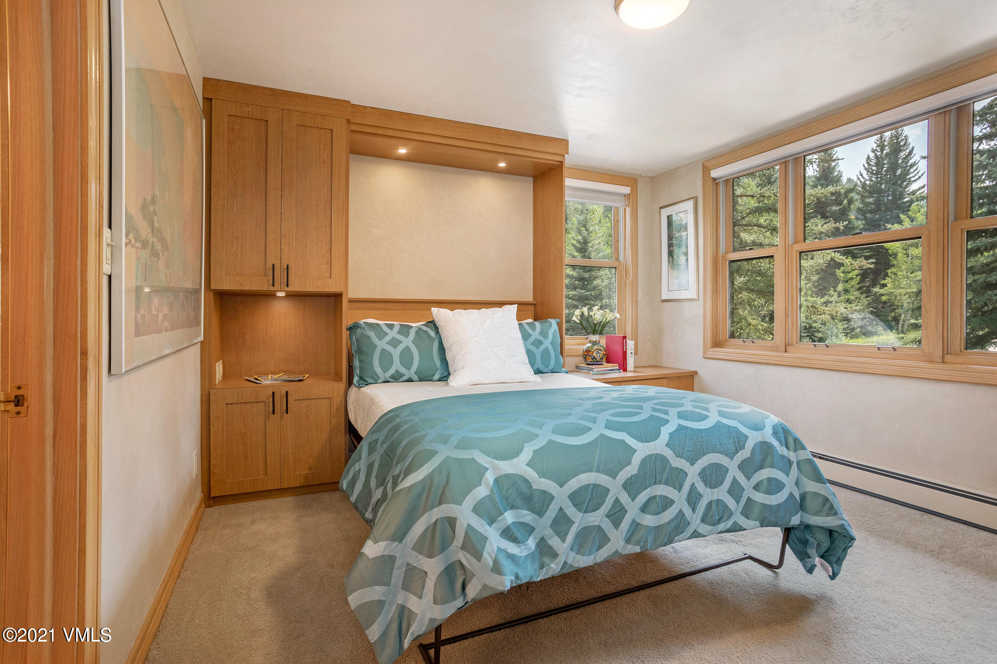 40 Elk Track Road, Unit 1 Beaver Creek, CO 81620 - Photo 20 of 31 a bedroom with a bed and a window