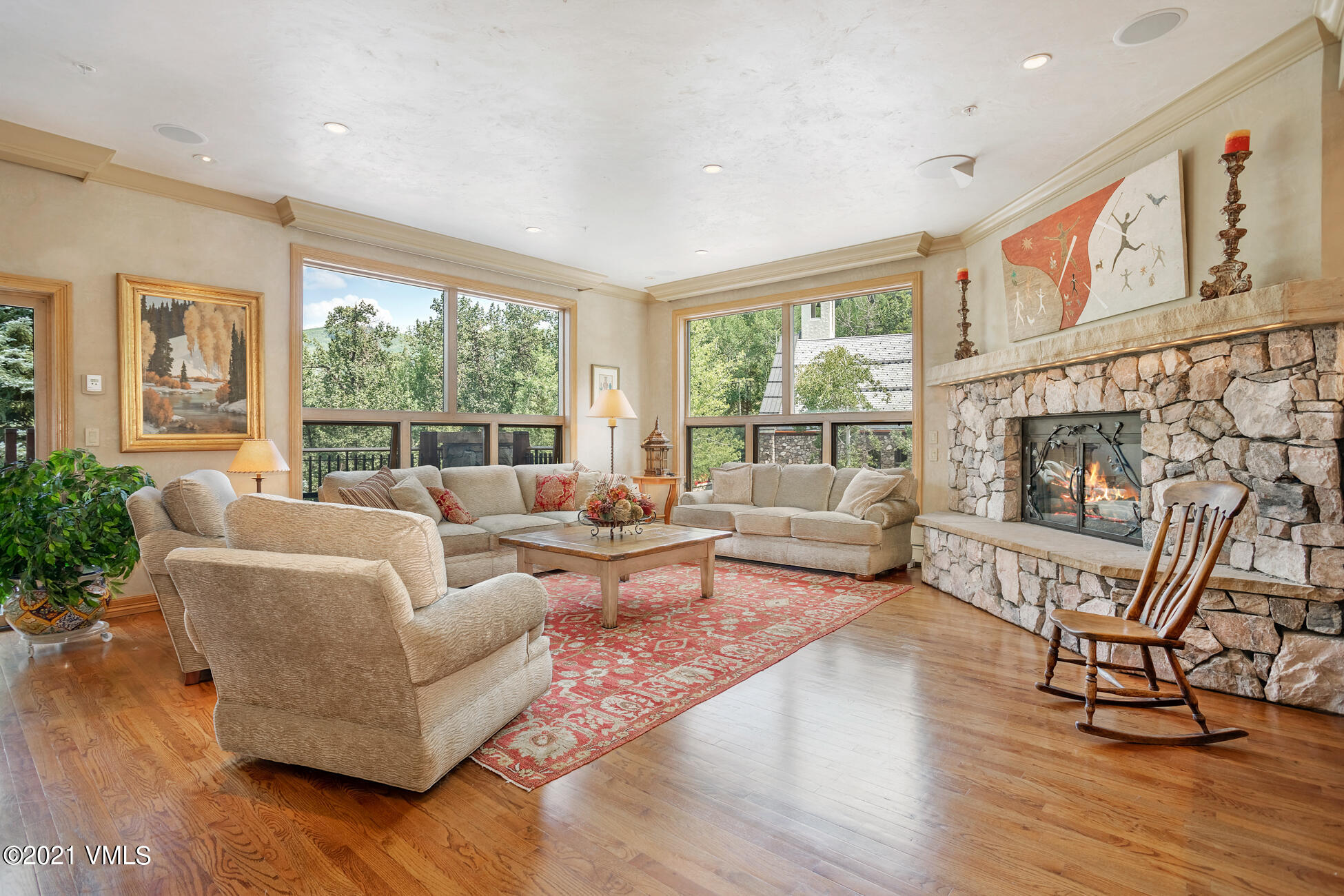 40 Elk Track Road, Unit 1 Beaver Creek, CO 81620 - Photo 2 of 31 a living room with furniture and a large window