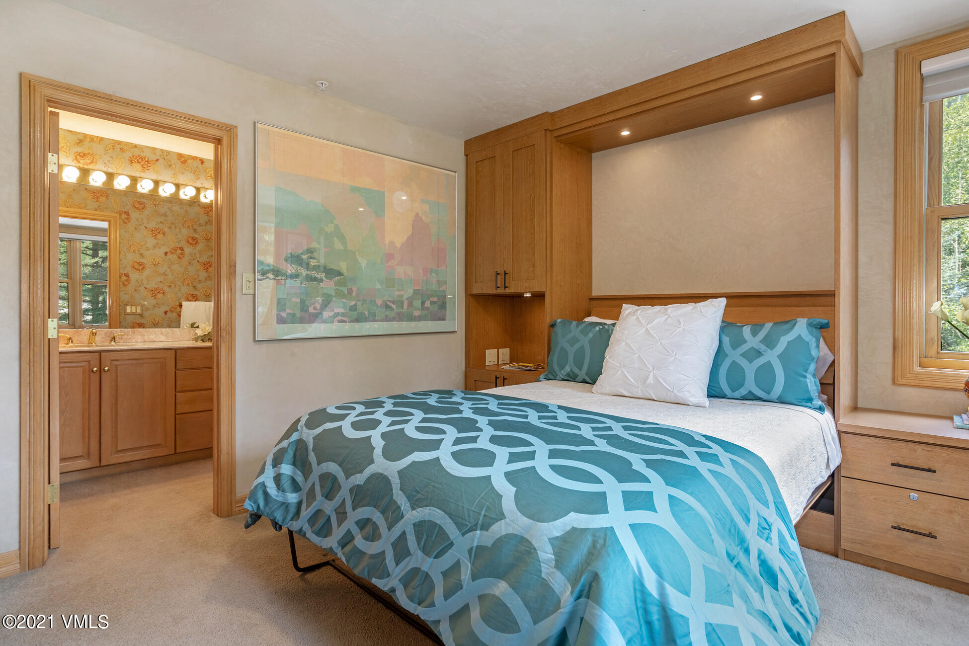 40 Elk Track Road, Unit 1 Beaver Creek, CO 81620 - Photo 21 of 31 a bedroom with a large bed and a window