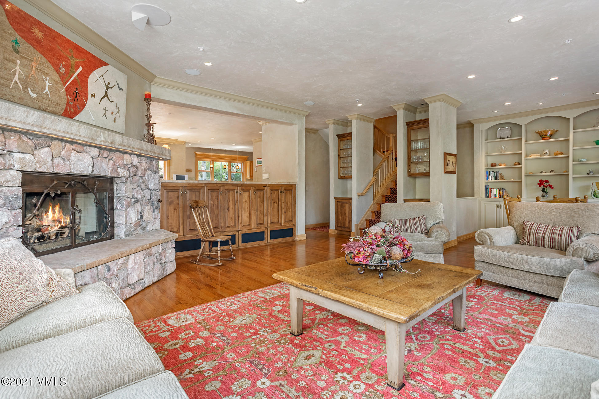 40 Elk Track Road, Unit 1 Beaver Creek, CO 81620 - Photo 5 of 31 a living room with furniture and a fireplace