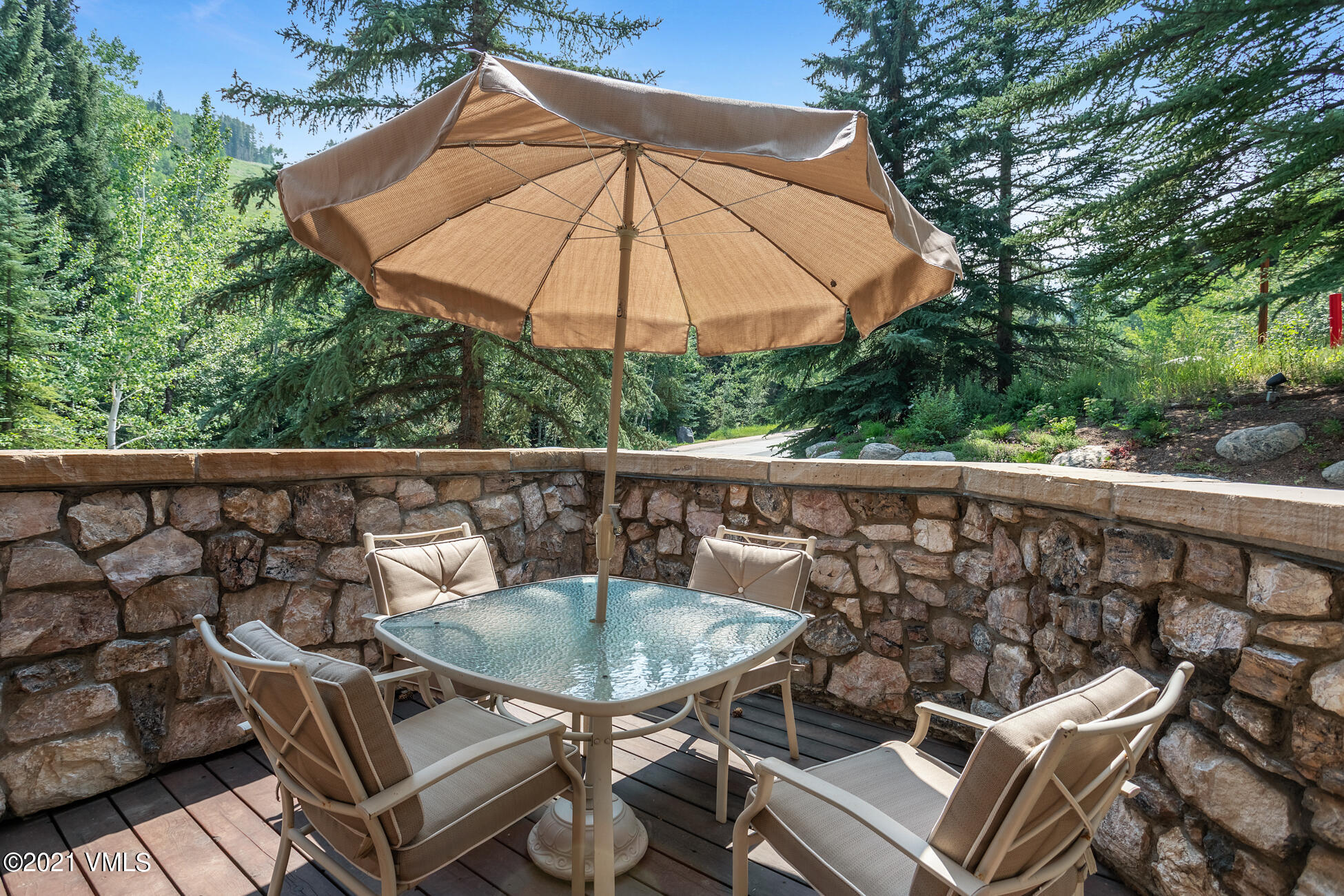 40 Elk Track Road, Unit 1 Beaver Creek, CO 81620 - Photo 8 of 31 a view of balcony with furniture and umbrella