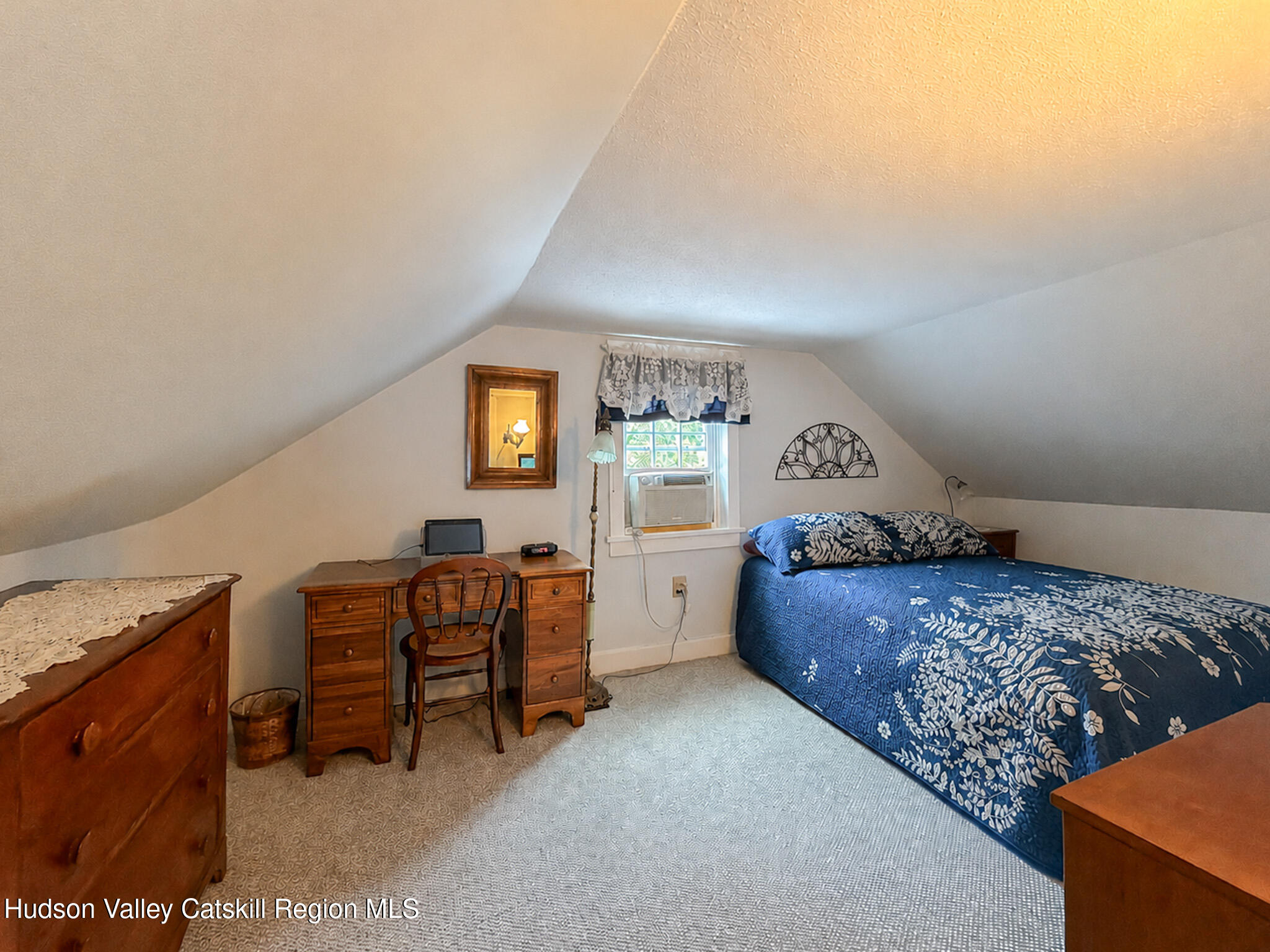221 Camp Medusa Road Rensselaerville, NY 12120 - Photo 17 of 57 a bedroom with a bed and furniture