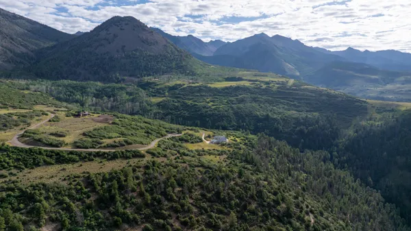 a view of mountains and valleys