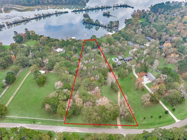 a view of a lake from a yard