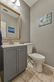 a bathroom with a toilet and a sink