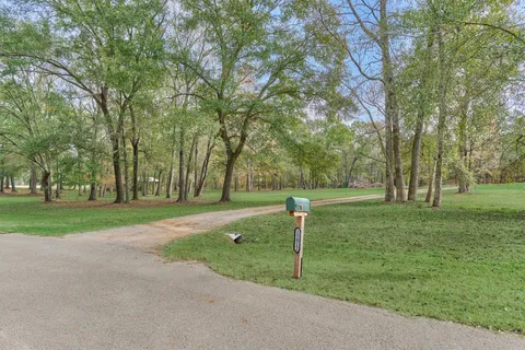 $925,000 | 15012 Lake Paula Drive, Willis, TX 77318