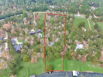 $950,000 | 15012 Lake Paula Drive, Willis, TX 77318