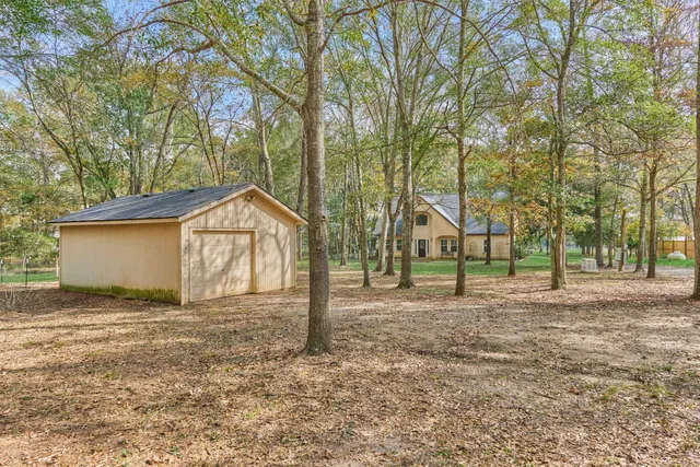 $950,000 | 15012 Lake Paula Drive, Willis, TX 77318