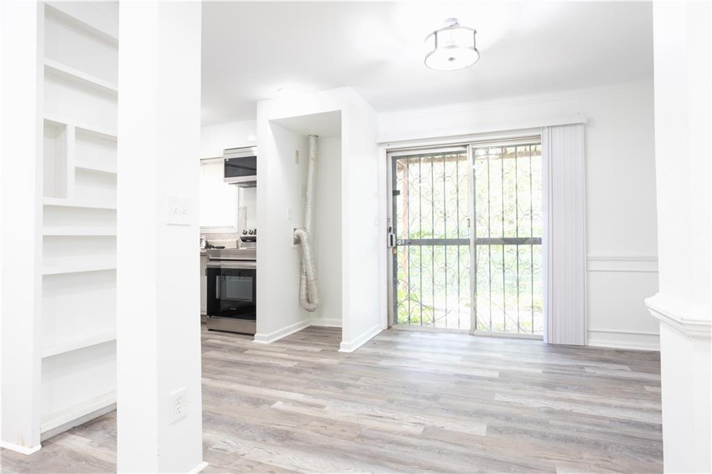 3232 Abbeywood Drive Decatur, GA 30034 - Photo 4 of 17 a view of an empty room with a window
