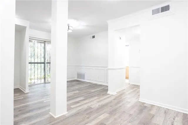 a view of entryway with wooden floor