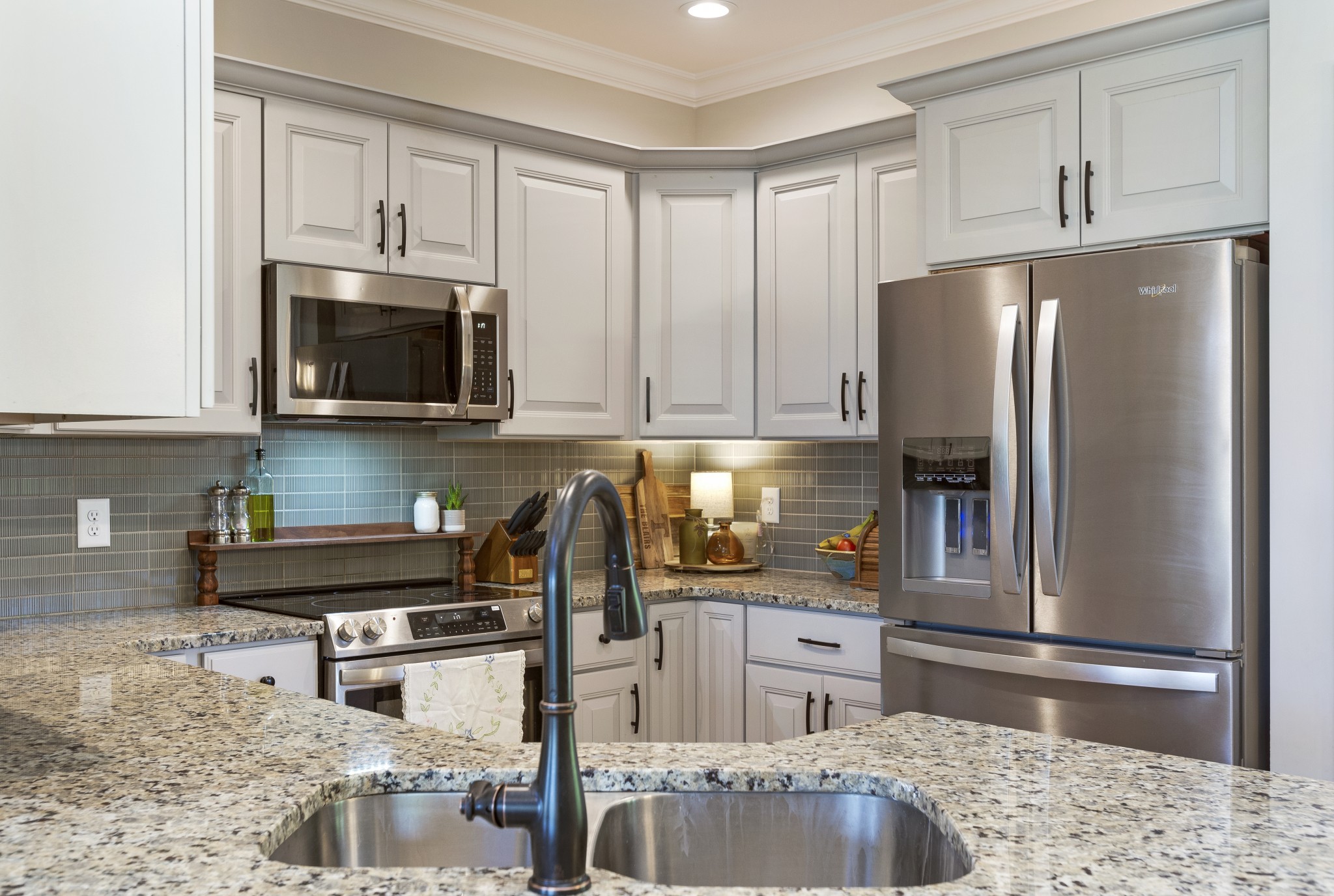 20 Shema Lane Lebanon, TN 37087 - Photo 12 of 38 a kitchen with stainless steel appliances granite countertop a refrigerator sink and stove