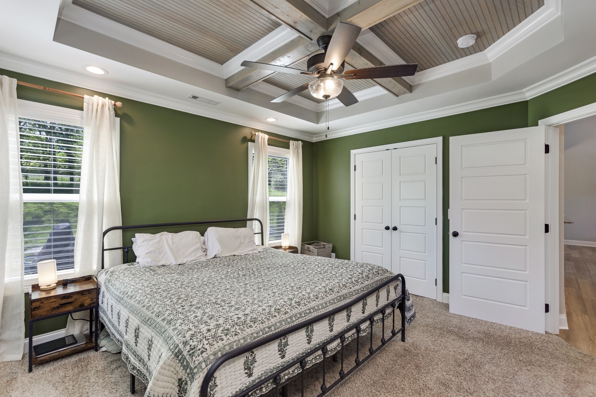 20 Shema Lane Lebanon, TN 37087 - Photo 15 of 38 a bedroom with a large bed and a chandelier