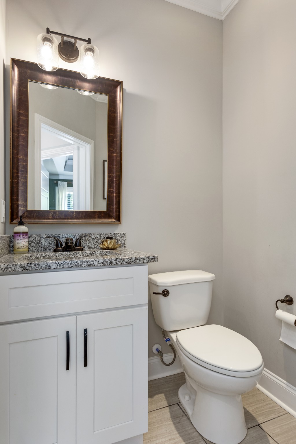 20 Shema Lane Lebanon, TN 37087 - Photo 20 of 38 a bathroom with a toilet sink vanity and mirror