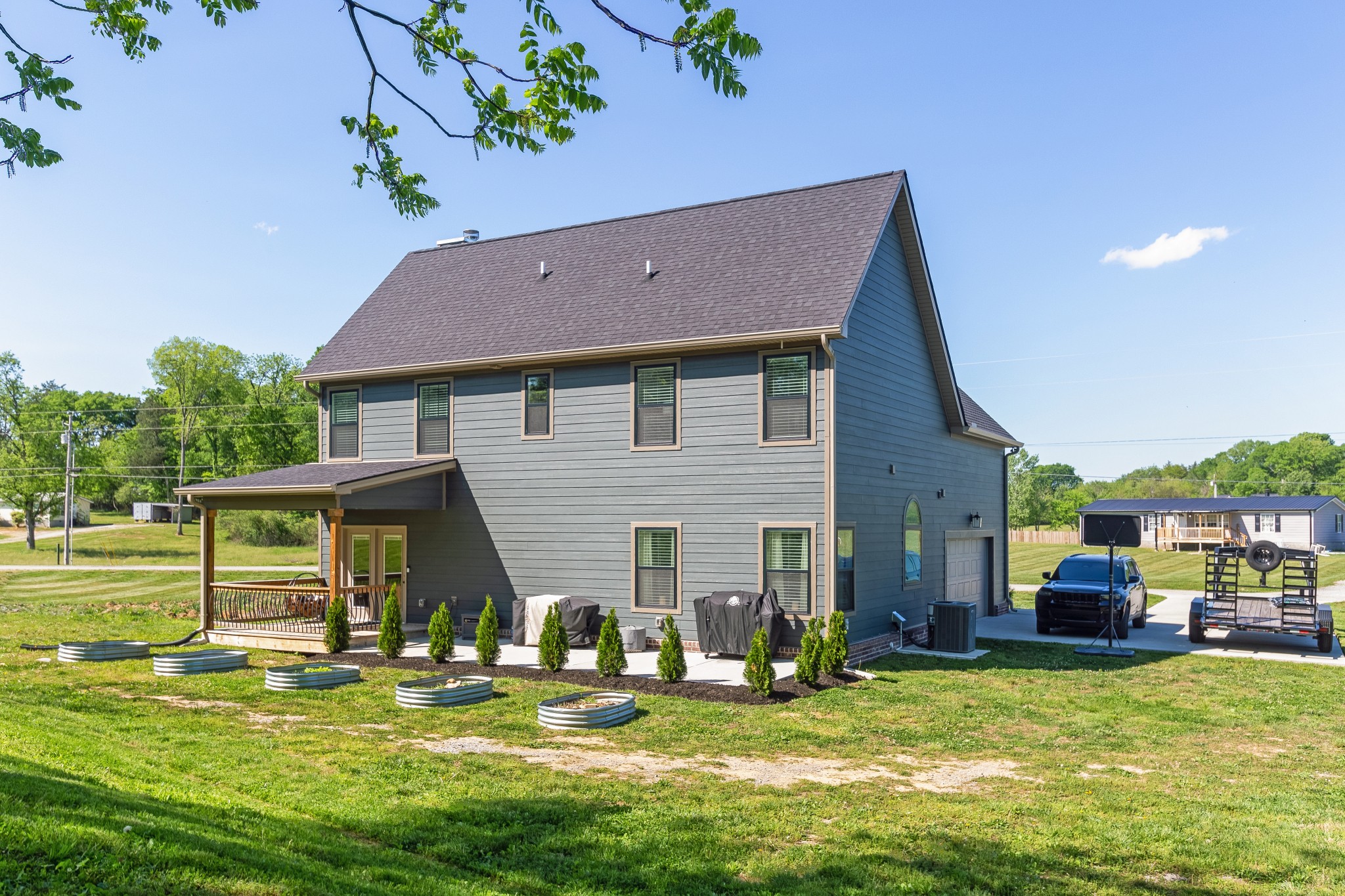 20 Shema Lane Lebanon, TN 37087 - Photo 34 of 38 a backyard of a house with yard table and chairs