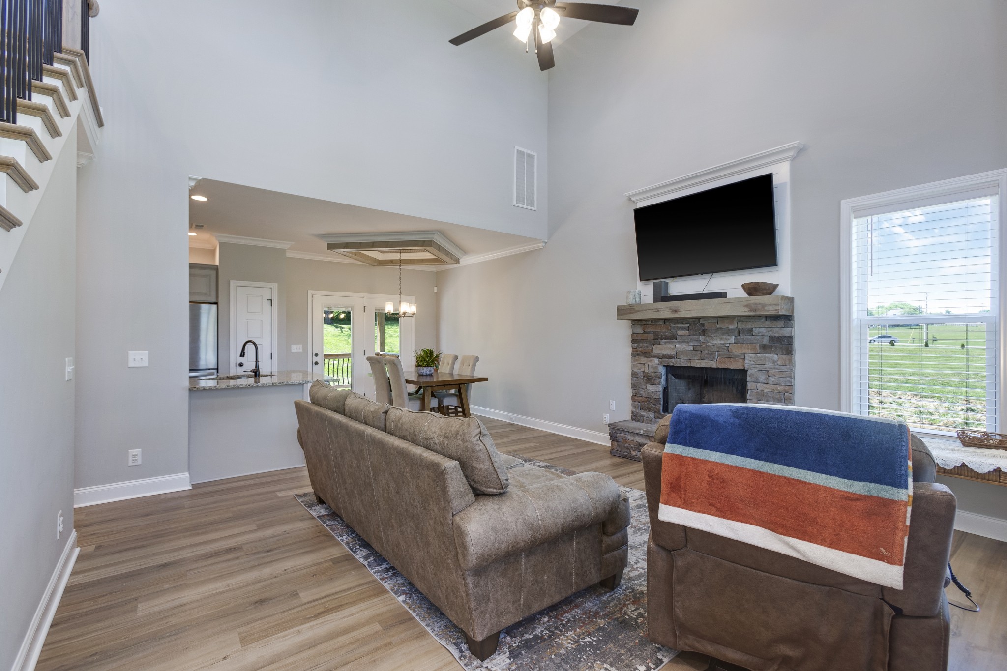20 Shema Lane Lebanon, TN 37087 - Photo 5 of 38 a living room with furniture a flat screen tv and a fireplace