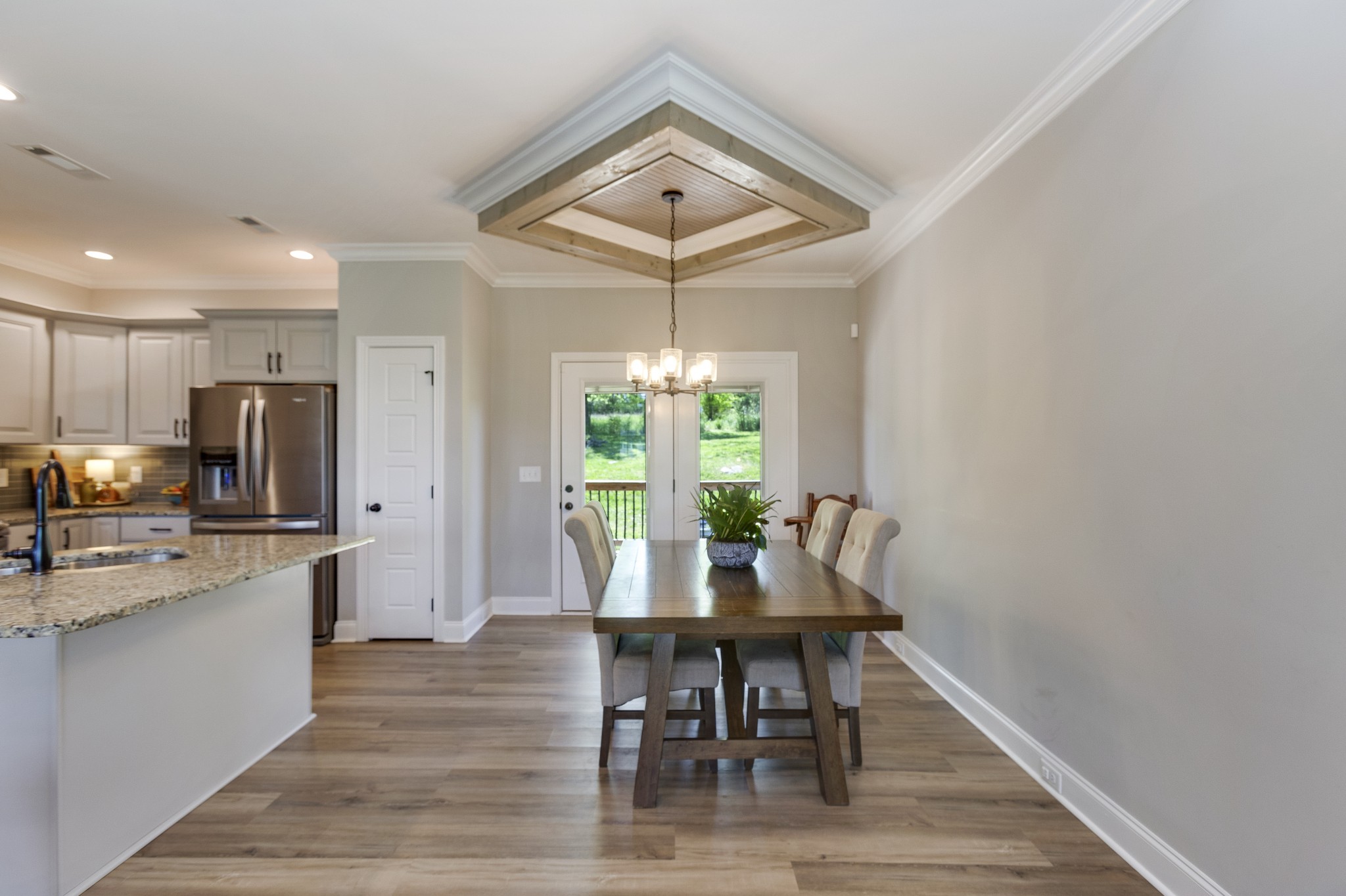 20 Shema Lane Lebanon, TN 37087 - Photo 8 of 38 a dining room with furniture a chandelier and wooden floor