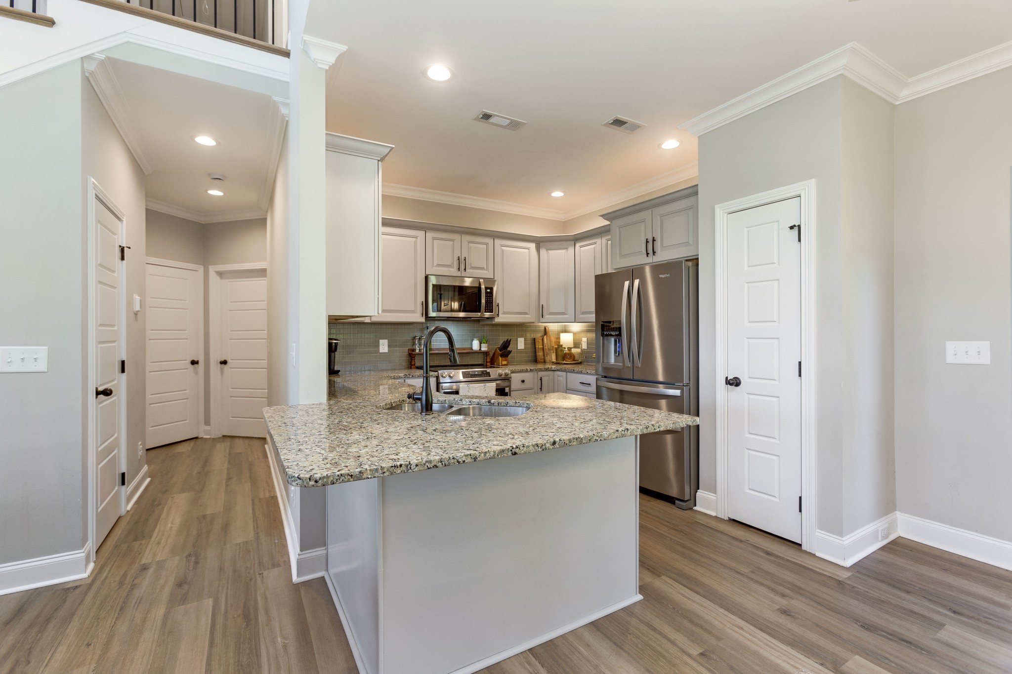 20 Shema Lane Lebanon, TN 37087 - Photo 10 of 38 a kitchen with stainless steel appliances granite countertop a refrigerator a sink and a stove