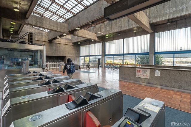 a kitchen with stainless steel appliances granite countertop a stove and a sink with cabinets