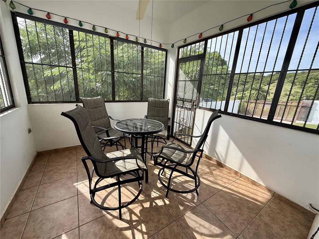 411 Bo Calvache Rincon, PR 00677 - Photo 9 of 14 a view of a patio with furniture