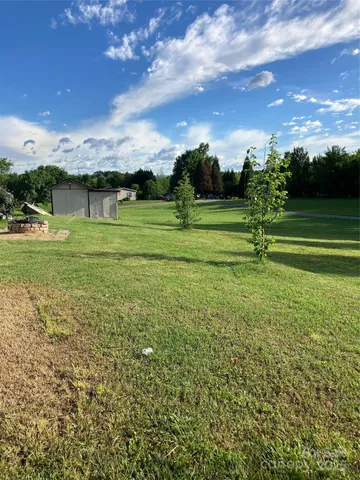 a view of a golf course with a lake